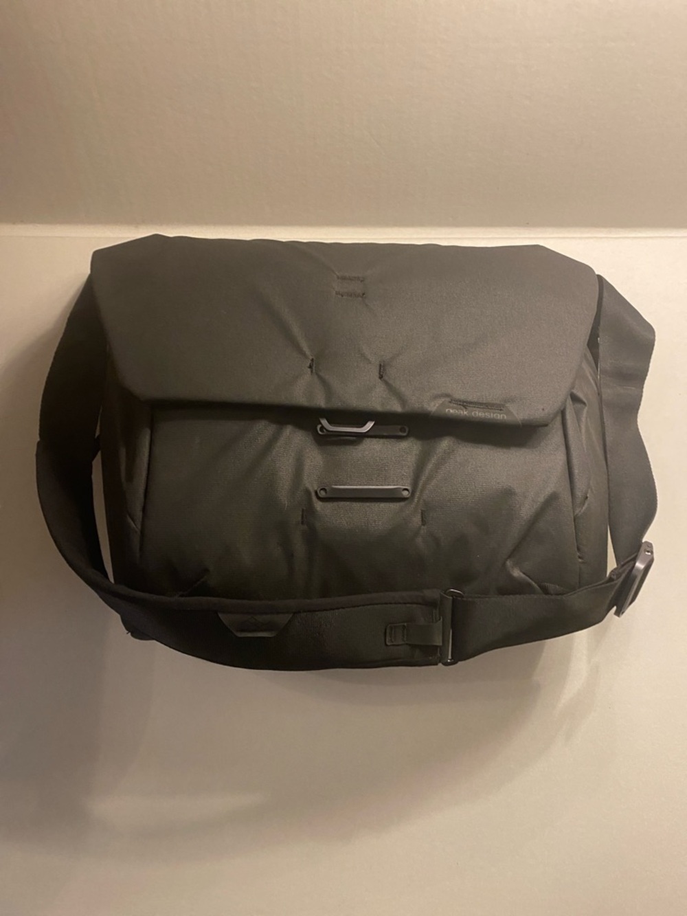 Tech-Ready Black Messenger Bag with Padded Laptop Compartment